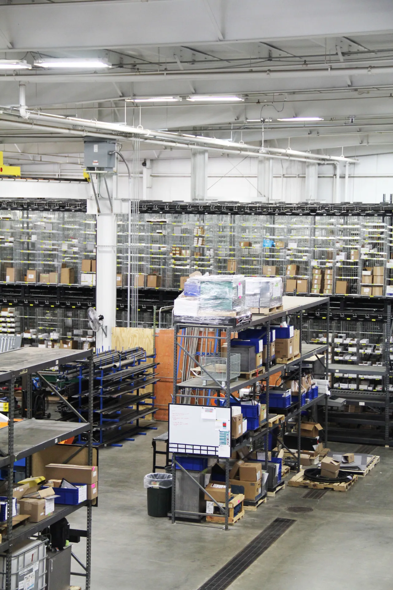 Rows of stocked inventory shelving inside the MFP warehouse